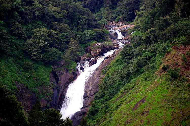 Panoramic landscape view of Attukad Waterfalls