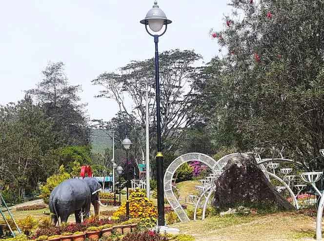 Family enjoying a trip at Hydel Park Munnar Kerala