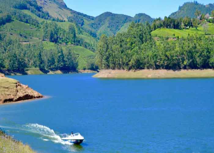 Couple enjoying boat ride at Mattupetty Dam