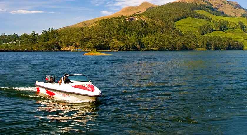 Mattupetty Dam boating with hills in background