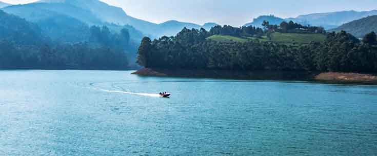 Sunset over Mattupetty Dam boating lake