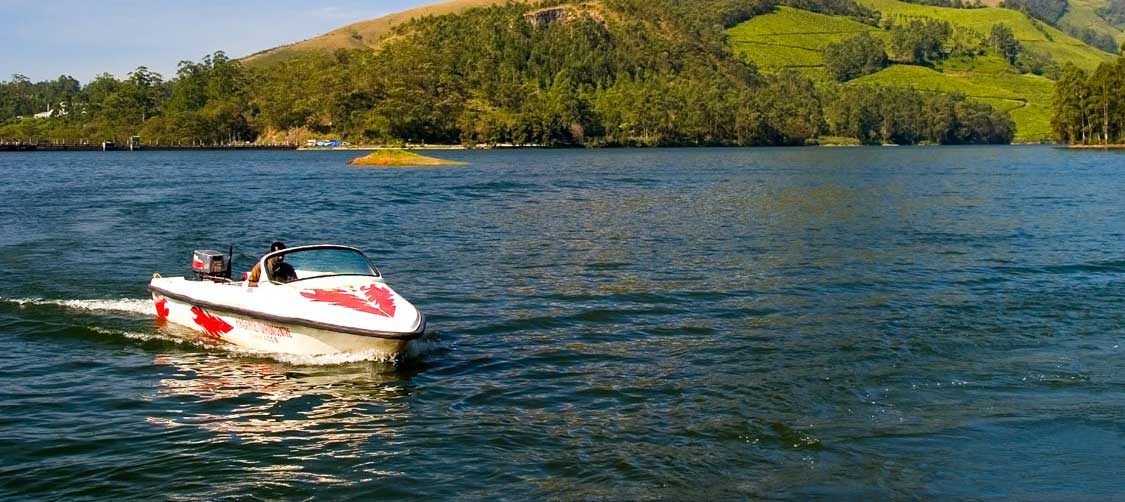 Mattupetty Dam boating in Munnar with tea gardens and hills