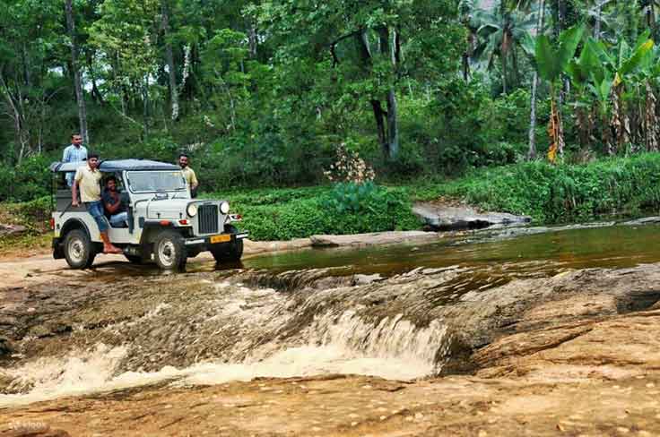 Adventure tourism in Munnar with river crossing activity