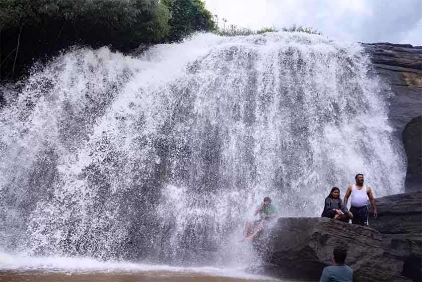 Kacharam Waterfalls Munnar with lush greenery and flowing cascades