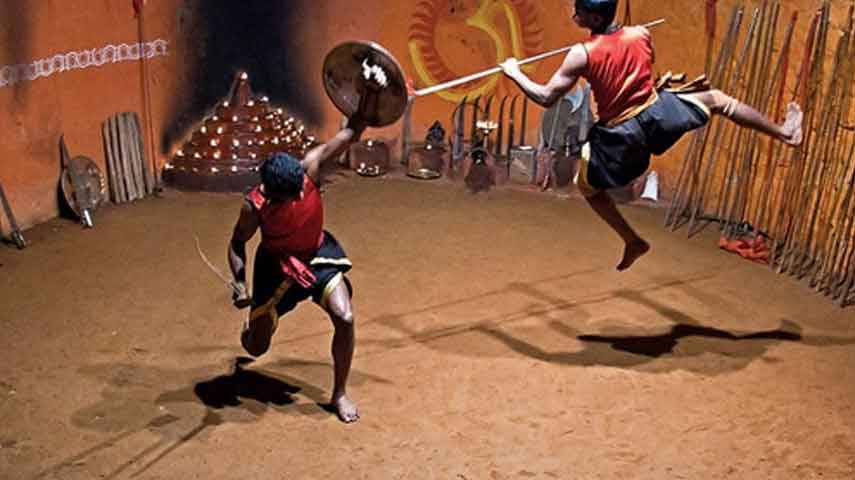 Kalaripayattu martial art performance in Munnar with traditional weapons and combat skills